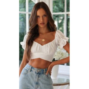 The new bow back is tied with a sexy solid color small top
